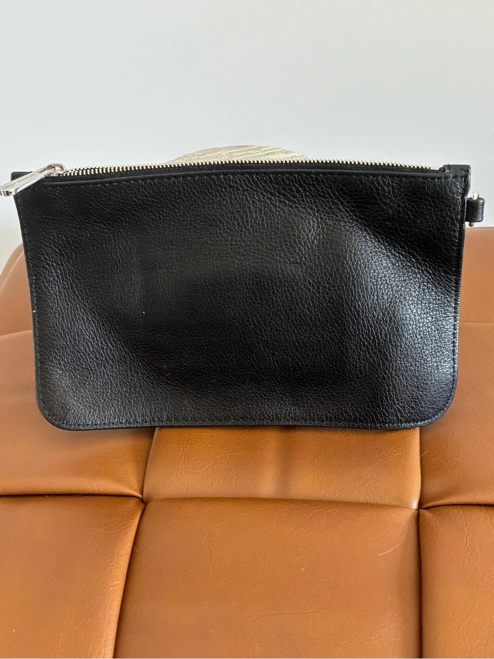 Michael Kors Black Pebbled Leather pouch with Silver Accents